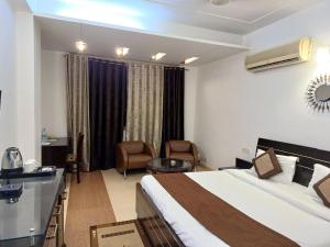 Postel nebo postele na pokoji v ubytování Skylark Hotel by Gabrian Hotels + 10 fotografií