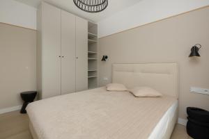 Posteľ alebo postele v izbe v ubytovaní CHILLIapartamenty - Polanki Aqua A307 - WYDMOWY + 37 fotografií