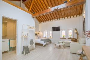 Televízia a/alebo spoločenská miestnosť v ubytovaní Living4Malaga Skyline Apartments