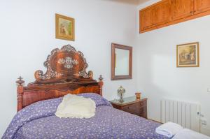 A bed or beds in a room at Es Pujols