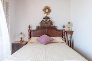 A bed or beds in a room at Es Pujols