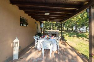 A garden outside Villino il Campone by VacaVilla