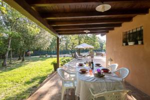 A garden outside Villino il Campone by VacaVilla