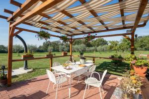 A garden outside Villino il Campone by VacaVilla