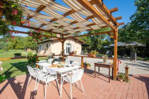 A garden outside Villino il Campone by VacaVilla