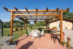 A garden outside Villino il Campone by VacaVilla