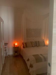 A bed or beds in a room at IL NIDO DEL FASO