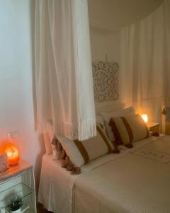 A bed or beds in a room at IL NIDO DEL FASO