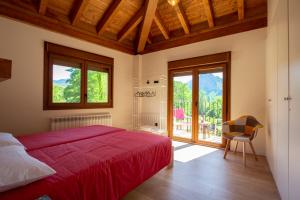 En eller flere senge i et værelse på Hotel Rural Villa Liquidámbar