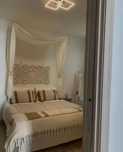 A bed or beds in a room at IL NIDO DEL FASO