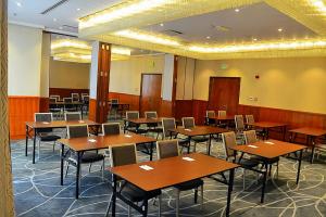 Een restaurant of ander eetgelegenheid bij Wonder Palace Hotel Qatar