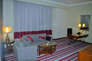 Een zitgedeelte bij Wonder Palace Hotel Qatar