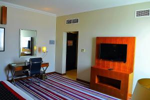 Een TV en/of entertainmentcenter bij Wonder Palace Hotel Qatar
