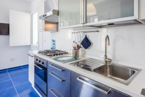 Kuchyň nebo kuchyňský kout v ubytování Case Vacanze Torre Lapillo by Porto Cesareo Camping & Village