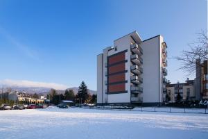 Obiekt Apartamenty Sun & Snow Ustroń Przy Rynku zimą