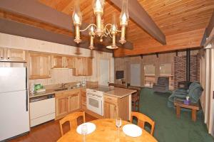 a kitchen with a table and a dining room at 0665 Yucatan in South Lake Tahoe