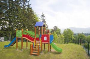 Detský kútik v ubytovaní Apart Invest Perła B12 + 13 fotografií