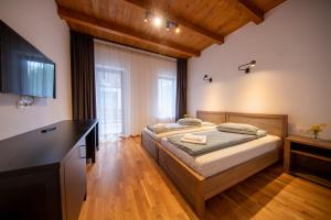 Postel nebo postele na pokoji v ubytování Castor
