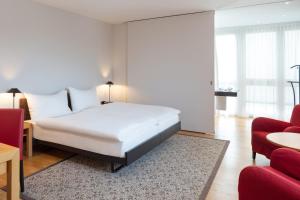 Letto o letti in una camera di Hotel Baslertor