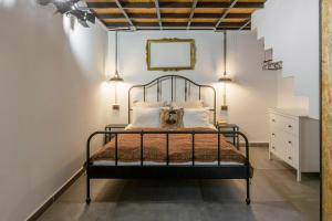 Posteľ alebo postele v izbe v ubytovaní The Address Loft 22ppl