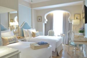 Postel nebo postele na pokoji v ubytování Noor Hotel + 24 fotografií