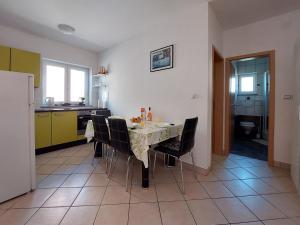 Kuchyň nebo kuchyňský kout v ubytování Apartment Niko