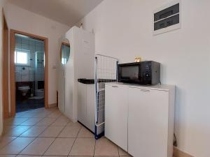 Kuchyň nebo kuchyňský kout v ubytování Apartment Niko