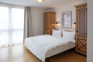 Letto o letti in una camera di Hotel Baslertor
