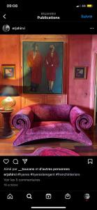 a page of a room with a purple couch at Chambres d'hôtes Le Regent in Hyères