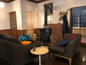 Posezení v ubytování GUEST HOUSE ZU-THONES HAKUBA