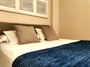 A bed or beds in a room at Durazno