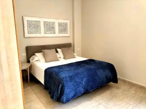 A bed or beds in a room at Durazno