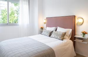 Posteľ alebo postele v izbe v ubytovaní PRECIOSO APARTAMENTO EN MARIA ZAMBRANO