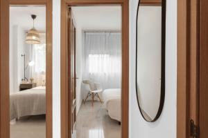 Posteľ alebo postele v izbe v ubytovaní PRECIOSO APARTAMENTO EN MARIA ZAMBRANO