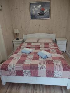 Posteľ alebo postele v izbe v ubytovaní Apartamenty pod Wilczakiem