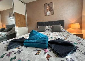 Postel nebo postele na pokoji v ubytování Apartman Enjoy