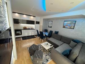 Posezení v ubytování Apartman Enjoy + 15 fotografií