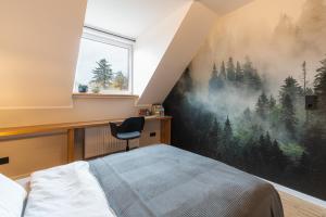 Postel nebo postele na pokoji v ubytování Waldbewohner Apartments / Fuchs