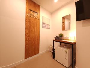 Televiisor ja/või meelelahutuskeskus majutusasutuses OYO Hostel Myeongdong 3