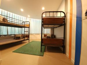 Voodi või voodid majutusasutuse OYO Hostel Myeongdong 3 toas