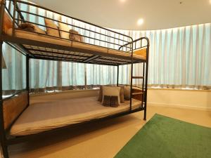 Voodi või voodid majutusasutuse OYO Hostel Myeongdong 3 toas