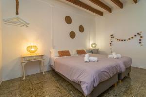 A bed or beds in a room at Son Indiot Még 37 kép