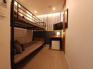 Voodi või voodid majutusasutuse OYO Hostel Myeongdong 3 toas
