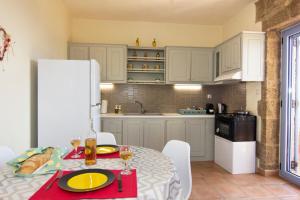 Kuchyň nebo kuchyňský kout v ubytování Orfea's Place