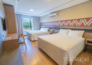 Cama ou camas em um quarto em Complexo Eco Cataratas Resort by SJ