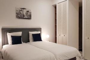 Posteľ alebo postele v izbe v ubytovaní Villa Luxe piscine intérieure SPA chauffée vue exceptionnelle sur vignoble