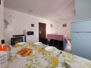 Kuchyň nebo kuchyňský kout v ubytování Apartment Niko