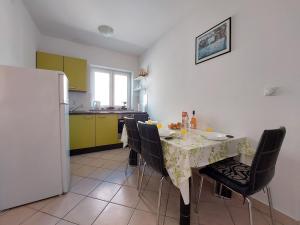 Kuchyň nebo kuchyňský kout v ubytování Apartment Niko