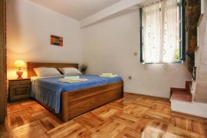 Voodi või voodid majutusasutuse B&B Apart Hotel Paštrovski Konak toas