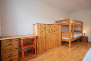 Postel nebo postele na pokoji v ubytování Krásný vybavený byt u sjezdovky + 2 fotografie